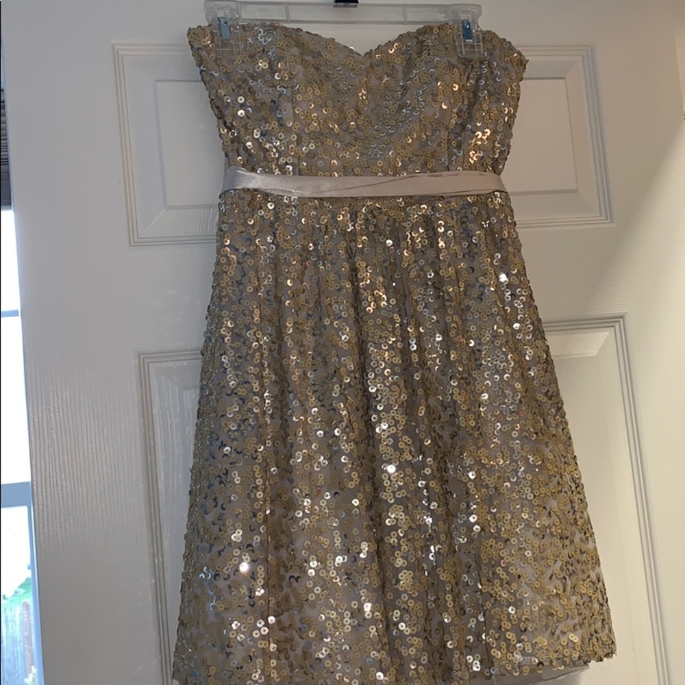 Gold sequined strapless formal dress